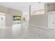 Open concept living room featuring sleek floors and tons of natural light at 9885 Montclair Circle Cir, Apopka, FL 32703