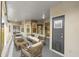 Covered patio with comfortable seating, offering a relaxing outdoor space at 9885 Montclair Circle Cir, Apopka, FL 32703