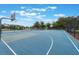 Well-maintained community basketball court with clear markings and updated hoops at 1010 Sugarberry Trl, Oviedo, FL 32765
