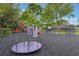 Large community playground with slides, climbing areas, and a merry-go-round at 1010 Sugarberry Trl, Oviedo, FL 32765