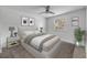 Comfortable bedroom featuring a queen bed, neutral decor, a ceiling fan and plenty of natural light at 106 Pine Tree Dr, Ormond Beach, FL 32174