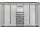 Walk-in closet with modern wire shelving, drawers and ample storage space at 106 Pine Tree Dr, Ormond Beach, FL 32174