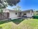 Charming backyard view with well-maintained lawn, and privacy fence at 1118 Ne 17Th Ave, Ocala, FL 34470