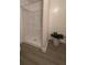 Bathroom featuring standing shower, floors, and a decorative plant at 1118 Ne 17Th Ave, Ocala, FL 34470