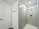 Shower with tiled walls and a built-in seat at 1118 Ne 17Th Ave, Ocala, FL 34470