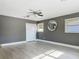 Bedroom featuring a ceiling fan, closet and neutral wall color at 1118 Ne 17Th Ave, Ocala, FL 34470