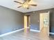Bedroom featuring a ceiling fan and wood-look floors at 1118 Ne 17Th Ave, Ocala, FL 34470