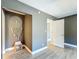 Bedroom featuring a decorative wall hanging and wood-look floors at 1118 Ne 17Th Ave, Ocala, FL 34470