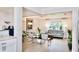 Open-concept living room with stylish furniture, hardwood floors, and plenty of natural light at 1118 Ne 17Th Ave, Ocala, FL 34470