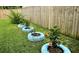 Backyard tire planters adding whimsical touch to the landscape and yard at 1118 Ne 17Th Ave, Ocala, FL 34470