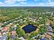 Aerial view showcasing the beautiful community with pond at 112 Overton Gardens Lane, Deland, FL 32724