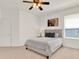 A cozy bedroom featuring a ceiling fan and a serene color palette at 112 Overton Gardens Lane, Deland, FL 32724