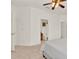 A bedroom with an ensuite bathroom and walk-in closet at 112 Overton Gardens Lane, Deland, FL 32724