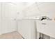 Laundry room featuring a utility sink, washer and dryer at 112 Overton Gardens Lane, Deland, FL 32724
