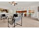 Open floor plan connecting the living room, kitchen, and dining area at 112 Overton Gardens Lane, Deland, FL 32724