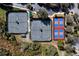 Aerial view of several tennis and pickle ball courts ready for your enjoyment at 112 Overton Gardens Lane, Deland, FL 32724
