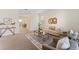 Inviting living room features neutral tones, modern furnishings, and an open layout, perfect for relaxation and entertaining at 11386 Biography Way, Orlando, FL 32832