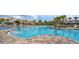 Stunning pool area with crystal-clear water and inviting amenities at 11386 Biography Way, Orlando, FL 32832