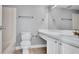 Bathroom includes white cabinets, updated fixtures and a shower and bath combo at 115 Oyster Bay Cir # 260, Altamonte Springs, FL 32701