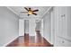 Inviting bedroom with wood floors, ceiling fan and ample closet space at 115 Oyster Bay Cir # 260, Altamonte Springs, FL 32701