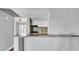 Modern kitchen with granite countertops, mosaic backsplash, and stainless steel appliances at 115 Oyster Bay Cir # 260, Altamonte Springs, FL 32701
