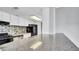 Kitchen boasts granite countertops, stainless steel appliances, and sleek cabinetry at 115 Oyster Bay Cir # 260, Altamonte Springs, FL 32701