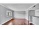 Open floor plan showcasing hardwood floors and a seamless flow into other living spaces at 115 Oyster Bay Cir # 260, Altamonte Springs, FL 32701