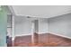 Spacious living room features hardwood floors and neutral paint at 115 Oyster Bay Cir # 260, Altamonte Springs, FL 32701