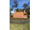 Entrance to the 'Fountain View' community with brick signage and well-maintained landscaping at 1315 Lawndale Cp, Ormond Beach, FL 32174