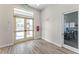 Light and bright entry lobby featuring glass doors, tile floors, and access to the building's leasing offices at 1315 Lawndale Cp, Ormond Beach, FL 32174