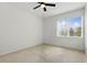 Bedroom featuring a ceiling fan and window at 13329 Harbor Shore Ln, Winter Garden, FL 34787