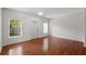 Spacious living room featuring laminate floors, neutral walls, and natural light at 13329 Harbor Shore Ln, Winter Garden, FL 34787