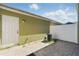 Cozy outdoor patio with brick pavers is perfect for relaxing and entertainment with access door to the home at 13329 Harbor Shore Ln, Winter Garden, FL 34787