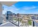Stunning cityscape view from the balcony with clear glass railings and modern design at 150 E Robinson St # 2408, Orlando, FL 32801