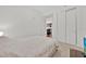 Bright bedroom with a view into the kitchen, featuring modern fixtures at 150 E Robinson St # 2408, Orlando, FL 32801