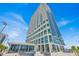 Luxury high-rise building with modern glass windows, private balconies, and common areas for socializing at 150 E Robinson St # 2408, Orlando, FL 32801