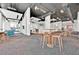 Expansive clubhouse featuring modern design, communal tables, and ample seating areas at 150 E Robinson St # 2408, Orlando, FL 32801