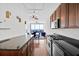 Open kitchen with granite countertops, stainless steel appliances, and hardwood floors at 150 E Robinson St # 2408, Orlando, FL 32801
