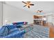 Bright living room with hardwood floors, ceiling fans, and comfortable seating at 150 E Robinson St # 2408, Orlando, FL 32801