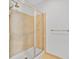 Tiled shower with sliding glass door at 150 E Robinson St # 2408, Orlando, FL 32801