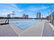 Spacious sports court for basketball, volleyball, and other games with beautiful city views in the background at 150 E Robinson St # 2408, Orlando, FL 32801