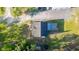 Aerial view of the home, outdoor patio, and surrounding landscape at 1555 Seminole Run Rd, Osteen, FL 32764