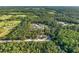 Aerial view of acreage featuring a large property with mature trees at 1555 Seminole Run Rd, Osteen, FL 32764