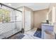 Recently remodeled bathroom has tile floors, granite countertops and a full glass shower enclosure at 1555 Seminole Run Rd, Osteen, FL 32764