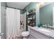 This full bathroom has a tub, a shower, and a single sink vanity with hard surface counter tops at 1555 Seminole Run Rd, Osteen, FL 32764