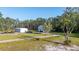 Wide open lot with home and shop at 1555 Seminole Run Rd, Osteen, FL 32764