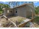 Exterior view of the back of the home showing the backyard at 1611 Creekwood Run, Lakeland, FL 33809