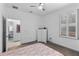 Bedroom with shuttered window at 1611 Creekwood Run, Lakeland, FL 33809