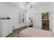 Bedroom with closet, side tables and ensuite bathroom at 1611 Creekwood Run, Lakeland, FL 33809