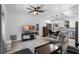 Bright living room with modern furnishings, open to the kitchen and bedroom entrance at 1611 Creekwood Run, Lakeland, FL 33809